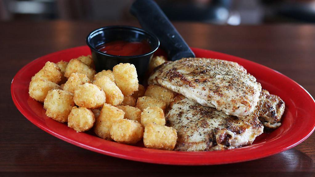 Griddle-Seared Chicken · Two marinated chicken breasts perfectly seasoned and seared with choice of side.