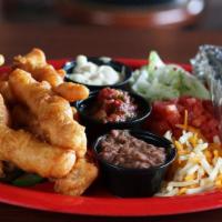 Crispy Fish Tacos · Drake's beer-battered white fish, sautéed onions and peppers, flour tortillas and all the fi...