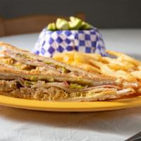 Authentic Cuban Sandwich · Roasted pork, ham, Swiss cheese, mustard, pickles and our signature sauce on Cuban bread. Se...