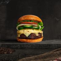 Justice Jalapeno Burger · Seasoned plant-based patty topped with melted vegan cheese, jalapenos, lettuce, tomato, onio...