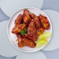 Bbq Sizzler Chicken Wings · Fresh chicken wings breaded, fried until golden brown, and tossed in barbecue sauce. Served ...