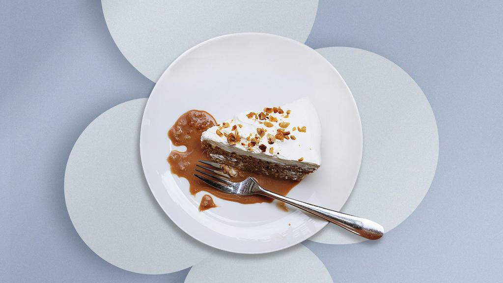 Turtle Cheese Cake · An ultra-rich cheesecake topped with caramel, chocolate and pecans.