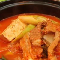 Kimchi Jigae/Kimchi Stew · Spicy Kimchi Stew tofu and pork. Comes with Rice and Served with two Daily side dishes inclu...