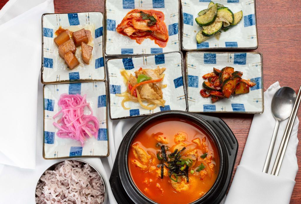 Soon Dubu Jigae/Seafood Tofu Soup · Spicy seafood tofu soup with mixed seafood, vegetables, and egg. Comes with rice and Served with two Daily side dishes include kimchi and one extra side dish of choice.