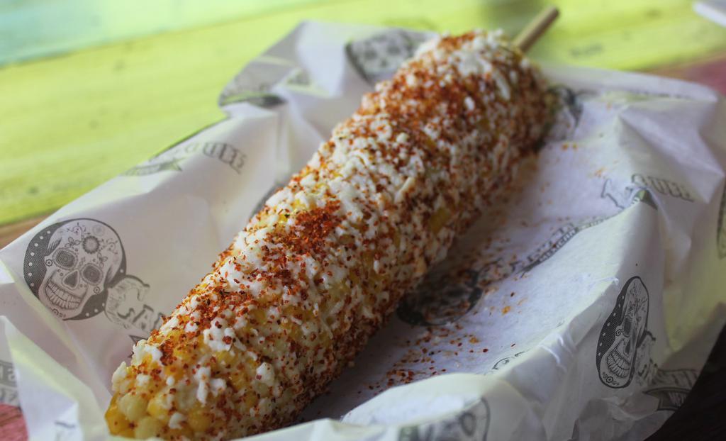 Mexican Street Corn (Saturday & Sunday) · Corn on the cobb topped with mayonnaise, queso fresco, and a blend of Mexican Spices.