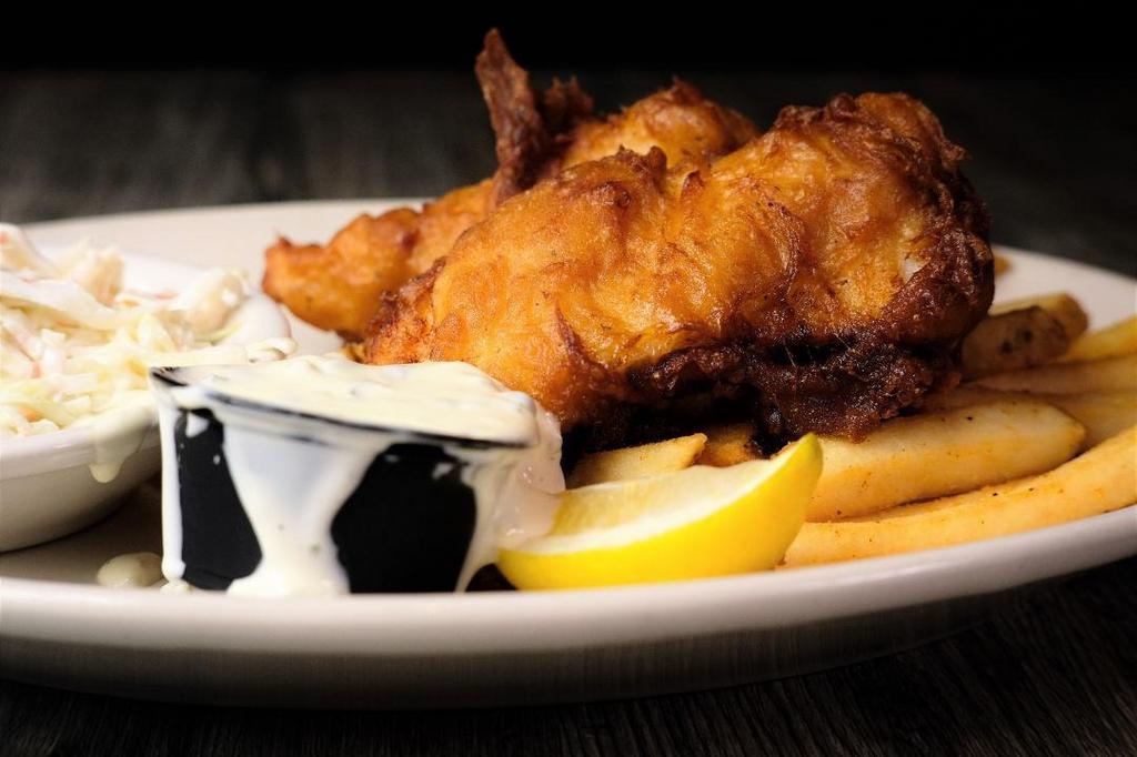 Fish And Chips 2 Piece · Fresh cut Cod hand dipped in our Guinness batter, fried to perfection. Served with fries and slaw.