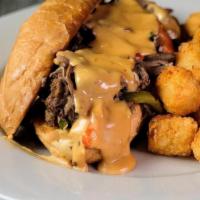 Pot Roast Cheesesteak · Tender house braised pot roast and sauteed bell pepper and red onion finished with our delic...