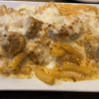 Amici’S Ziti · Ziti pasta prepared in a pink sauce with ricotta cheese and lightly breaded eggplant topped ...