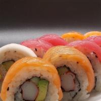 Rainbow Roll · Raw inside out tuna, whitefish, salmon, tuna, and avocado on top of California roll.