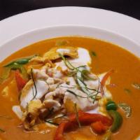 Panang Curry · Coconut milk with panang curry, bell peppers, citrus leaf, peanuts.