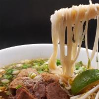 Pho Beef Soup · Thai boat noodle soup style, rice noodle, bean sprout, beef tender, meatball.