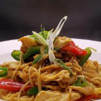 Singapore Noodles · Sauteed rice noodle with yellow curry powder,onion, green onion, and bell peppers.