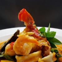 Seafood  Red Curry · Assorted seafood (shrimp, half lobster tail, scallop and mussel) bell pepper, bamboo shoots,...