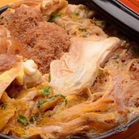 Katsu Don · Bowl of rice topped with deep fried pork, egg and onion.