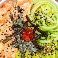 Wakame - Poke · Wakame Seaweed with Spicy Salmon, Fresh Avocado, Cucumber, Ikura, and Nori Seaweed.