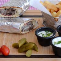Beef Shawarma Sandwich · Marinated beef, traditional hummus, Mediterranean tomato salad lettuce and tzatziki sauce. S...