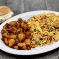 Nova & Onion Scramble · Chopped Nova and Onions Sautéed together and mixed in with Scrambled Fluffy Eggs.