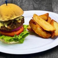 Roasters Burger · 1/2 lb. Burger topped with Sautéed Mushrooms, Onions and Melted Swiss Cheese on a Grilled Ka...