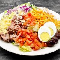 Chef'S Salad · Tossed Chilled Greens topped with Roast Beef, Turkey, Swiss Cheese, Cheddar Cheese, Tomatoes...