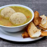 Matzah Ball Soup · Our Signature Soup 