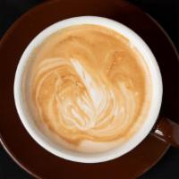 Latte · Steam milk with a shot of espresso.