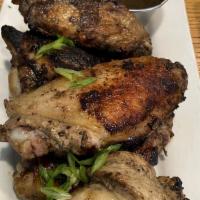 Jerk Chicken · Sall chicken marinated with a blend of herbs and spices grilled to perfection in our own fla...