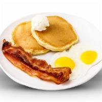 Two By Two By Two · 2 eggs any style, 2 buttermilk pancakes and your. choice of 2 bacon strips or 2 sausage links.