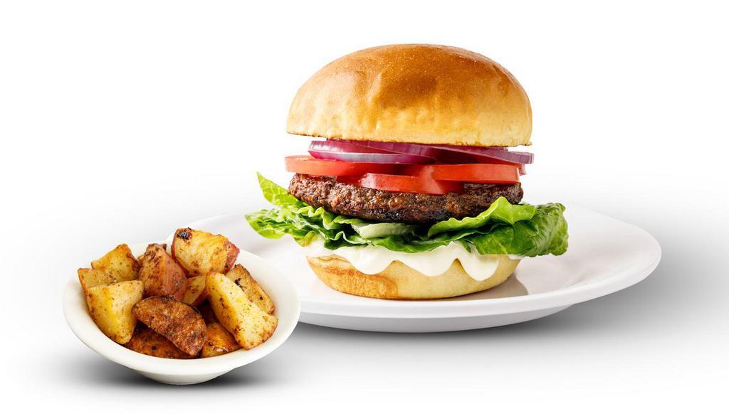 Impossible Burger · A juicy Impossible� burger made from plants served on a Challah roll with lettuce, tomato and red onion. Served with your choice of potatoes.