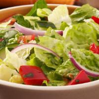 Garden Salad · Crispy shredded lettuce, tomatoes, onions and shredded cheddar cheese. A lite delight!