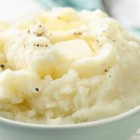 Mashed Potatoes · Whipped well and buttered! Pile 'em high and pour on the gravy!
