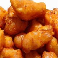 Fried Garlic Cheese Curds · Lightly battered garlic and Cheddar cheese curds, served with marinara.