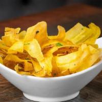 Mariquitas · Plantain Chips with mojo sauce