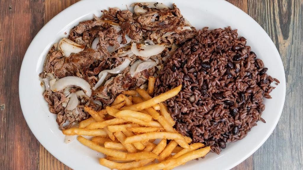 Vaca Frita · *(Polo Norte's Specialty Item) Grilled shredded beef with onions.