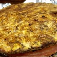 Cachapa · Cachapa tradicional rellenas queso de mano, nata criolla y queso blanco encima.