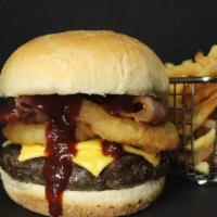 American Burger · Your choice of meat pbs styled, bacon, fried onion rings, cheddar cheese and barbecue sauce....