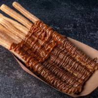 Yummy Churros (Skinny) · Traditional cinnamon or sugar churros with toppings of your choice.