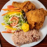 Fried Chicken · Served with rice and peas or white rice and vegetables.