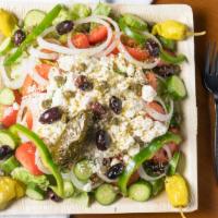 Small Greek Salad · Romaine lettuce, sliced tomatoes, cucumbers, onions, Kalamata olives, feta cheese, pepperonc...