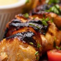 Chicken Skewer · Served with pita bread and our homemade tzatziki sauce.