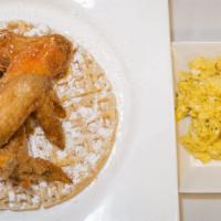 Waffles, Chicken Wings, And Eggs · Chicken waffle with eggs.