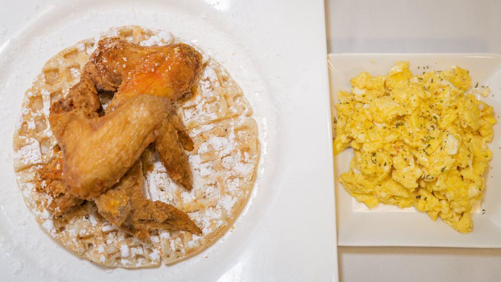 Waffles, Chicken Wings, And Eggs · Chicken waffle with eggs.