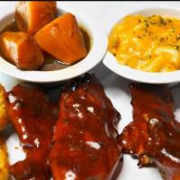 Turkey Rib Dinner · Three turkey ribs chargrilled and tossed in our homemade honey BBQ sauce. Served with your c...