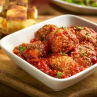 Piola Meatballs · Homemade beef and pork slow cooked in San Marzano sauce in San Marzano tomato sauce, served ...