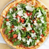 Moderna · Tomato sauce, mozzarella, diced tomatoes, fresh arugula and shaved Grana Padano cheese.