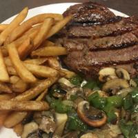 Ribeye Steak (10 Oz) · Served with sautéed fresh vegetables and French fries.