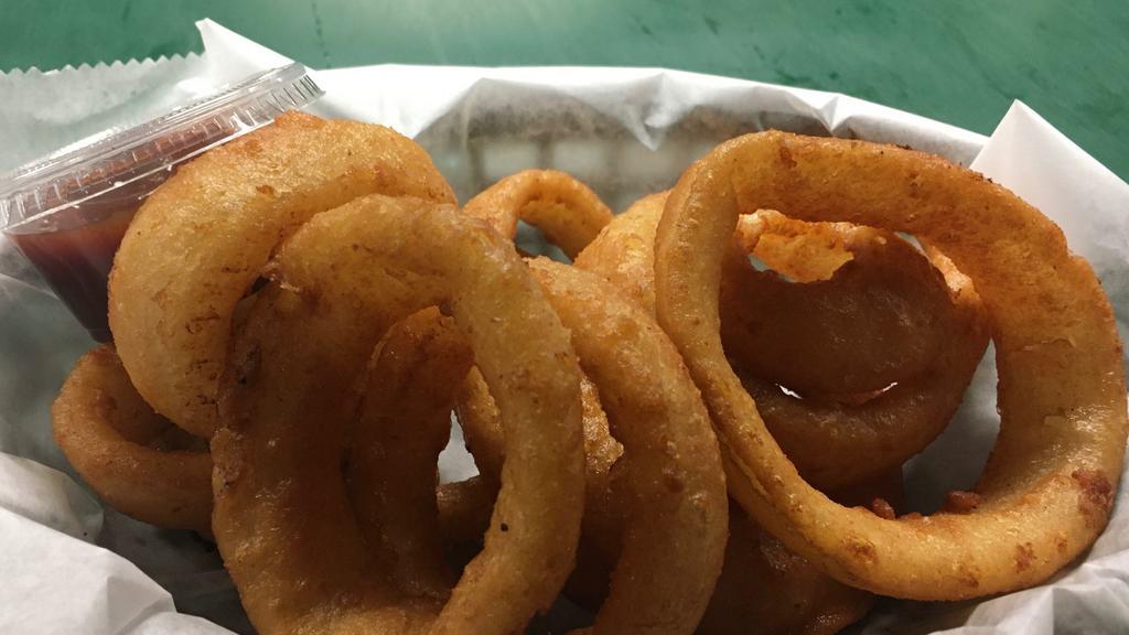 Basket Of Onion Rings · served with a side of BBQ for dipping