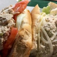 Tuna Sub · Our Solid White Albacore Tuna with provolone cheese, lettuce, tomato, onions.