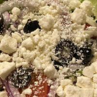 Greek Salad · Romaine lettuce, tomatoes, green peppers, onion, black olives and feta cheese.