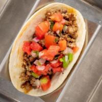 Impossible Taco · Ground impossible meat with pico de gallo, red onions, and cilantro..