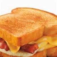 Texas Egg Sandwich · Texas toast served with your choice of meat, two eggs and yellow american cheese